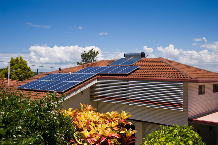 A house in Brisbane with a solar storage hot water system and a solar photovoltaic array